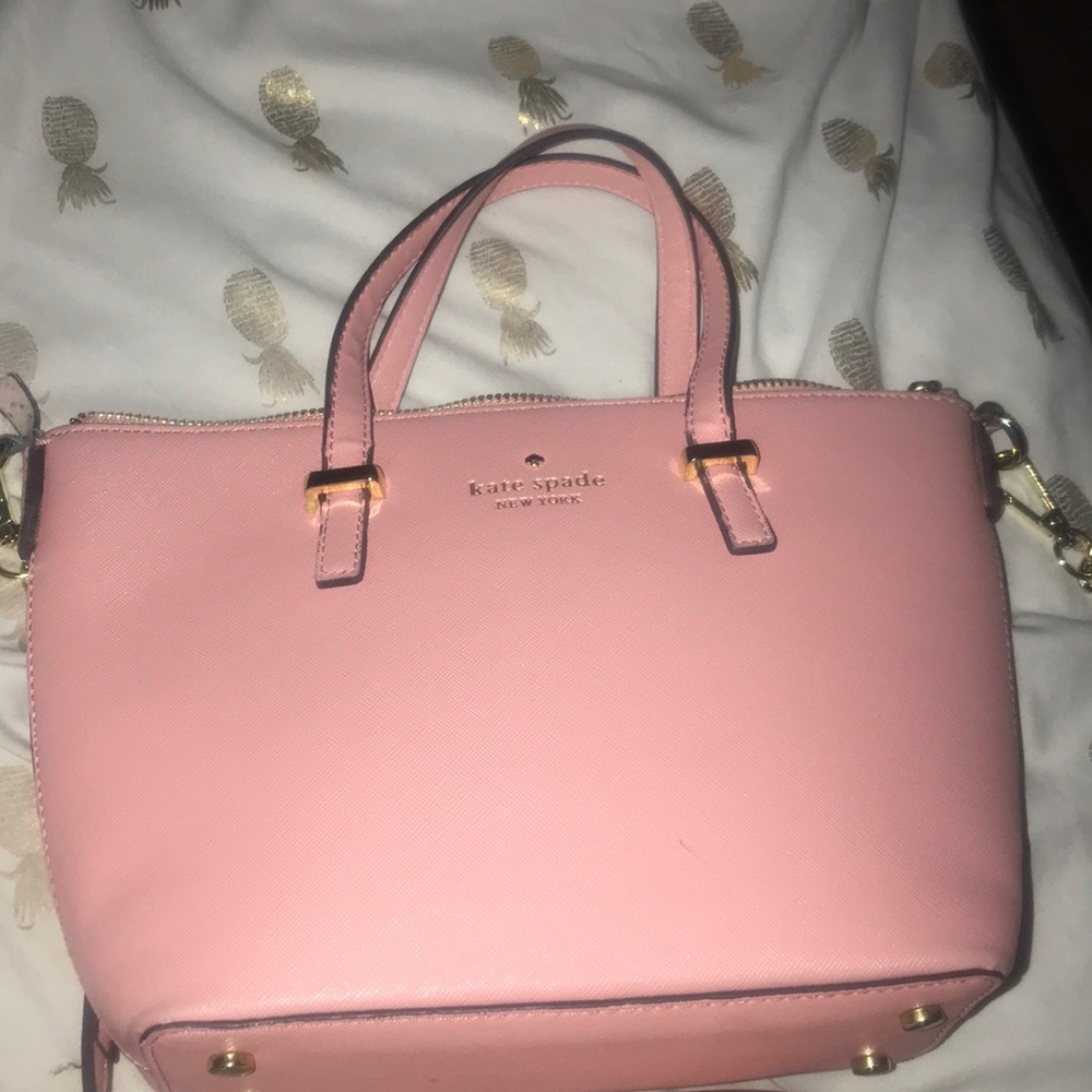 Baby pink Kate spade purse.